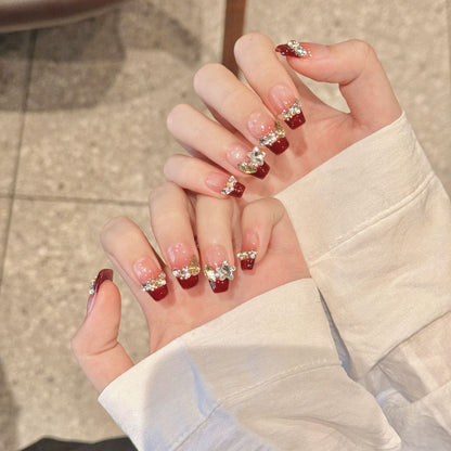 Purely handmade nail art with a high-end sense Berry red extremely sparkly crushed diamond French manicure for brides