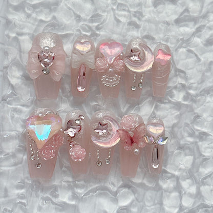 Girlish nail art with piled diamonds. Handmade press-on nail tips