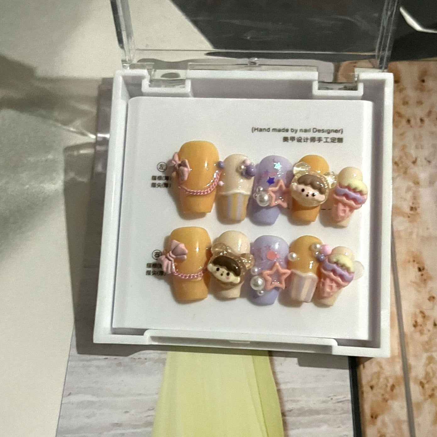 Handmade press-on nails. Cheese-flavored ice cream