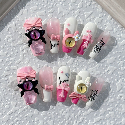 Handmade press-on nails. Pink little monster