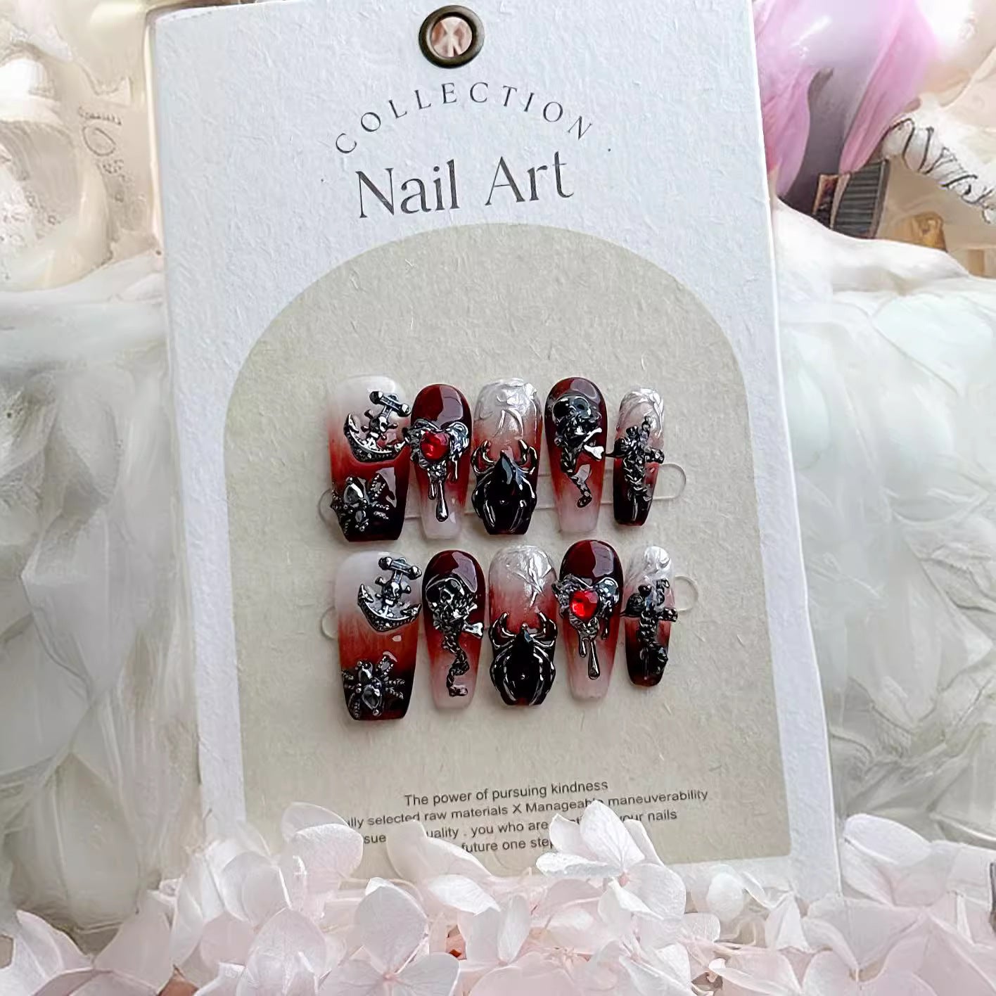 Handmade press-on nails with Chrome Hearts cross and blood color