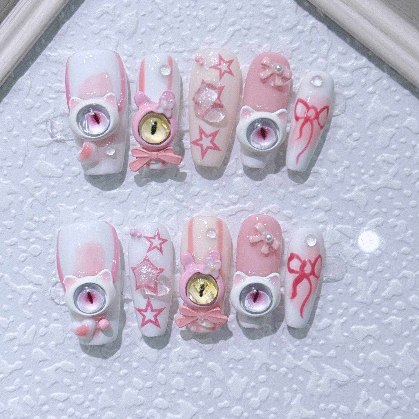 Handmade press-on nails. New style little devil nail art with three-dimensional monster eyes